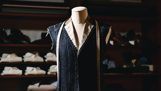 Mannequin with a tailored vest representing our mission to provide tailor-made solutions for clients.