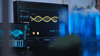 DNA chain animation on computers in genetic lab