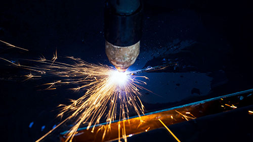 Industrial plasma machine cutting of metal plate
